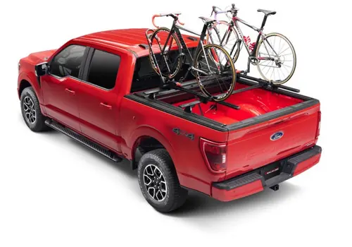 Discount Roll-N-Lock 2021-2025 Ford F-150 5'7" Bed | 2021-2025 Ford Raptor GEN3 (67.1in. Bed Length) A-Series XT Retractable Tonneau Cover - 131A-XT